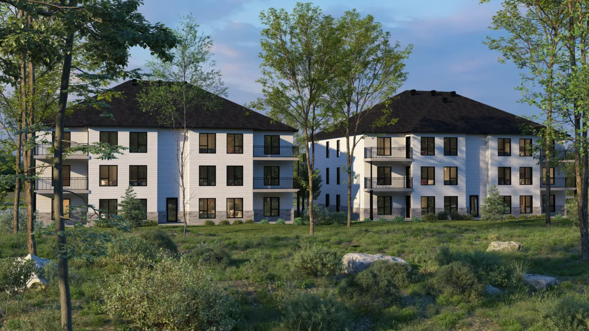 Rendu 3D de deux immeubles résidentiels de trois étages en lisière de boisé, en fin de journée